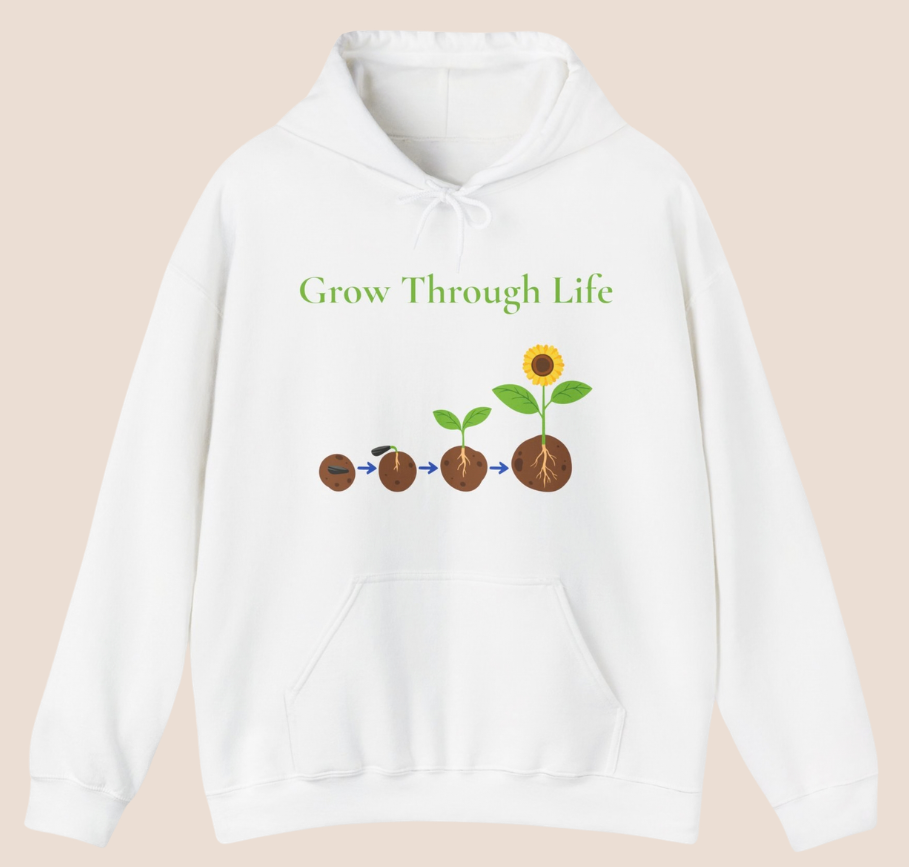 Weißer oder schwarzer Unisex Hoodie mit dem Schriftzug „Grow Through Life“ und einer Illustration vom Samen bis zur blühenden Sonnenblume als Symbol für persönliches Wachstum.