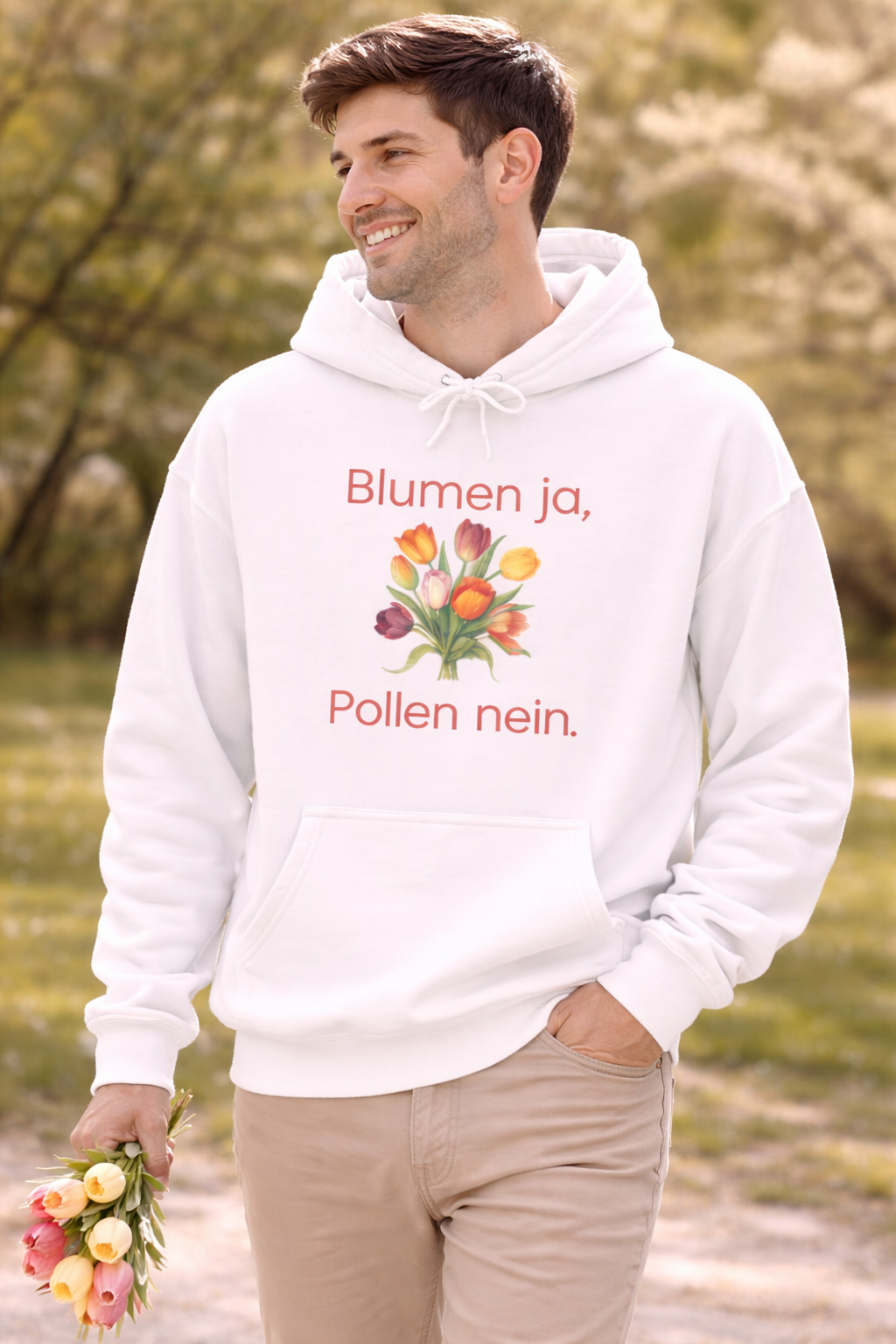Weißer Unisex-Hoodie mit buntem Blumenstrauß und dem humorvollen Spruch „Blumen ja, Pollen nein“ auf der Vorderseite.