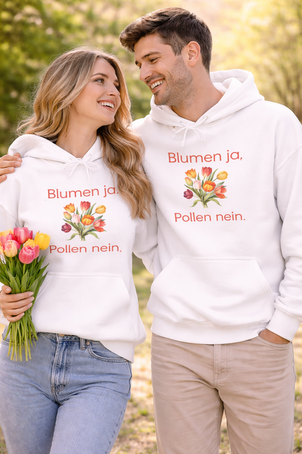 Weißer Unisex-Hoodie mit buntem Blumenstrauß und dem humorvollen Spruch „Blumen ja, Pollen nein“ auf der Vorderseite.