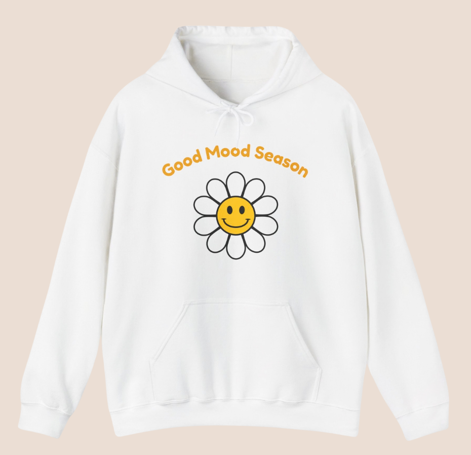 Weißer Unisex-Hoodie mit gelbem Smiley-Blumenmotiv und dem Schriftzug „Good Mood Season“ auf der Vorderseite.