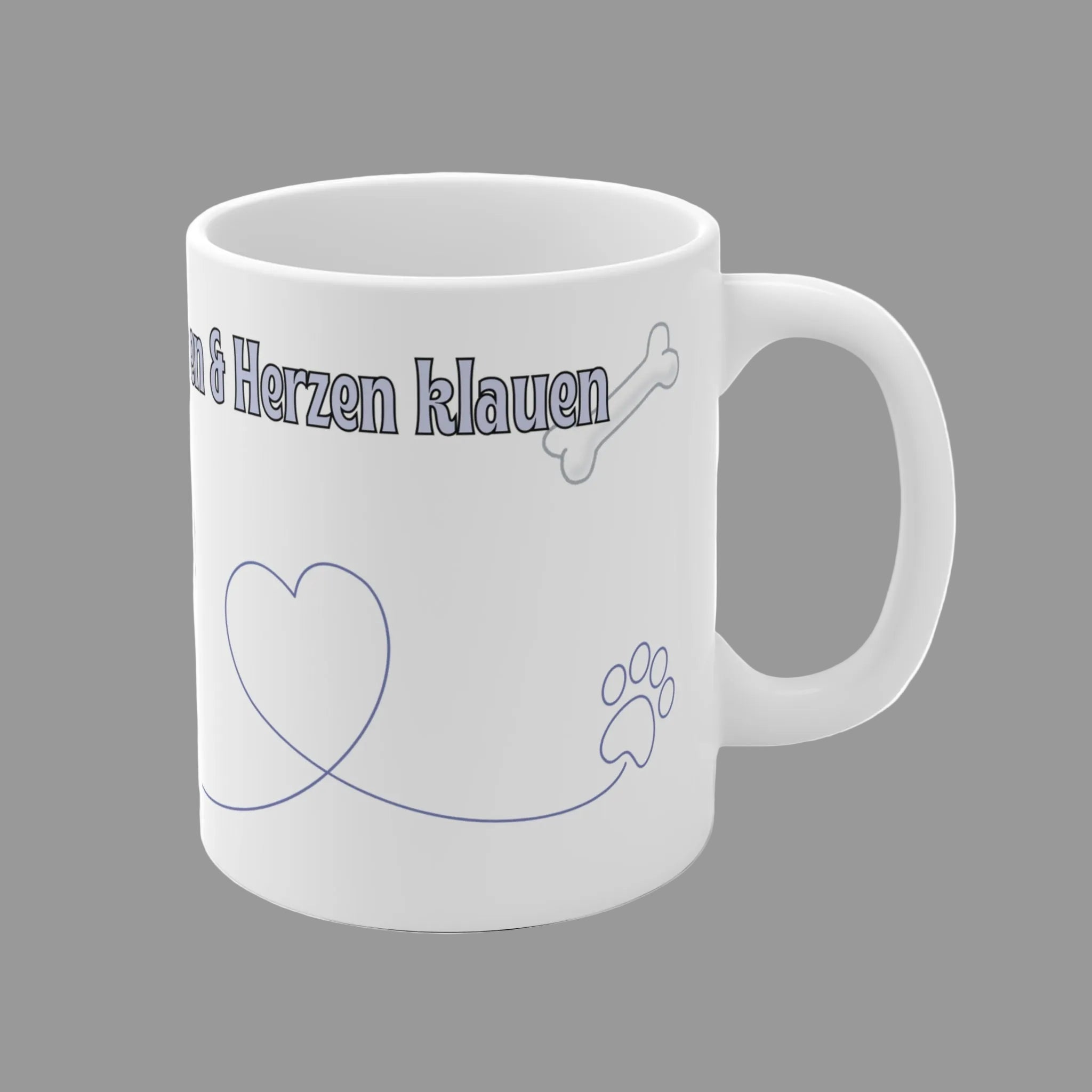 Weiße 330 ml Keramiktasse mit dem Spruch „Mein Hobby? Apportieren & Herzen klauen“, einem niedlichen Hund, Herz- und Pfotenmotiv – Geschenk für Hundeliebhaber.