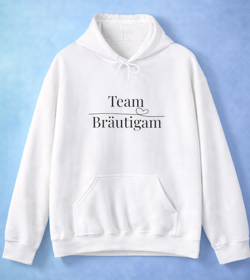 Weißer Unisex Hoodie mit schlichtem schwarzen Schriftzug „Team Bräutigam“ und kleinem Herz – ideal für Junggesellenabschiede und Hochzeiten.
