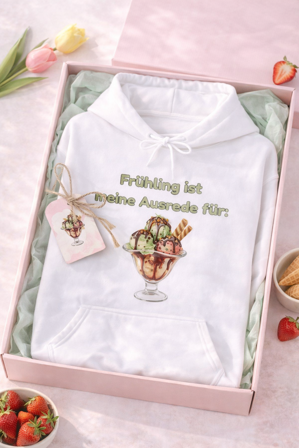 Weißer Unisex-Hoodie mit Spruch „Frühling ist meine Ausrede für Eis“ und großem Eisbecher-Motiv auf der Vorderseite.
