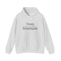 Weißer Unisex Hoodie mit schlichtem schwarzen Schriftzug „Team Bräutigam“ und kleinem Herz – ideal für Junggesellenabschiede und Hochzeiten.