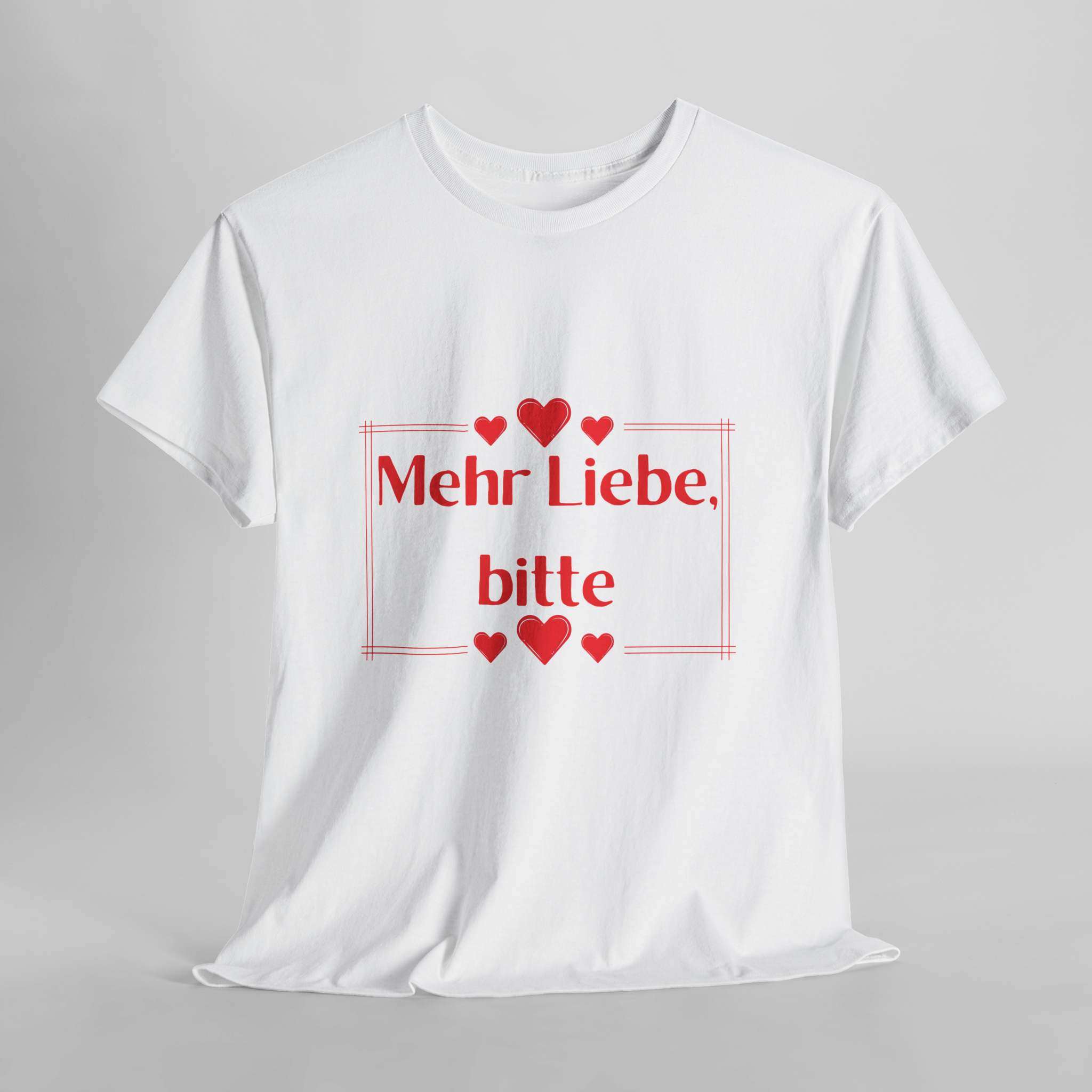 Unisex T-Shirt mit dem Schriftzug „Mehr Liebe, bitte“, dekorativen Herzen und schlichtem romantischem Design in Rot auf weißem oder rosafarbenem Shirt.