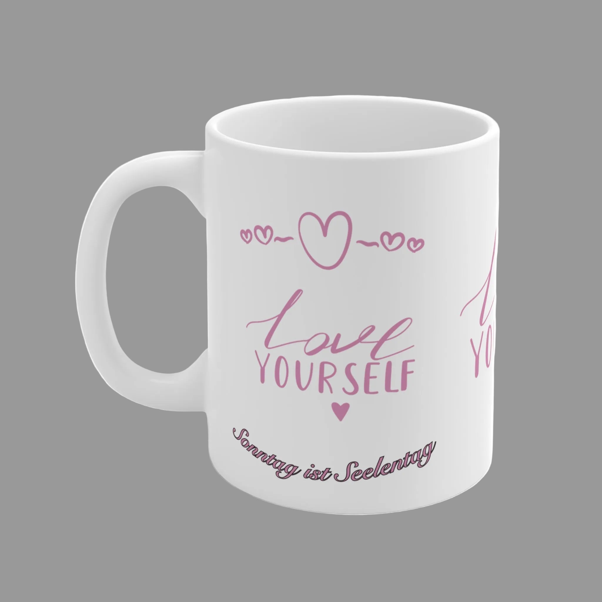 Weiße Keramiktasse mit rosa Schriftzug „Love Yourself“ sowie dem Spruch „Sonntag ist Seelentag“ und kleinen Herzmotiven – 300-ml-Tasse für Kaffee- und Teeliebhaber.